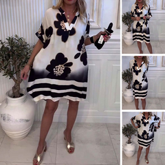 Damska luźna sukienka z głębokim dekoltem w szpic z nadrukiem