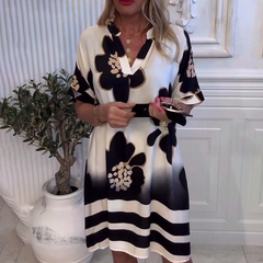 Damska luźna sukienka z głębokim dekoltem w szpic z nadrukiem