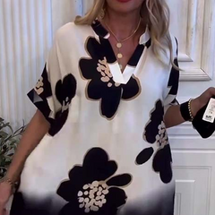 Damska luźna sukienka z głębokim dekoltem w szpic z nadrukiem