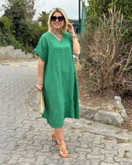 Solidna lniana sukienka maxi z dekoltem w serek i haftowanym dołem