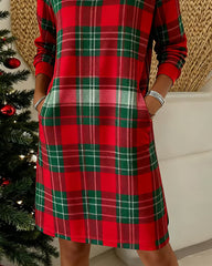 Sukienka bluzowa w kratę z długim rękawem