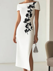 Elegancka sukienka łodzi z asymetrycznym nadrukiem kwiatowym