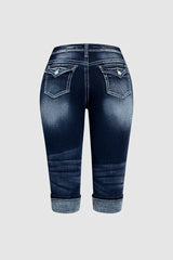 Jeansy Capri ze średnim stanem i kieszeniami, z rolowanym dołem