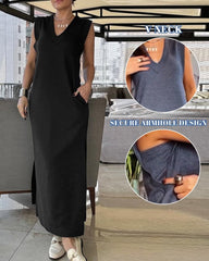 Sukienka swobodna z dekoltem w serek i rozcięciem na dole oraz bezpiecznym wycięciem na ręce