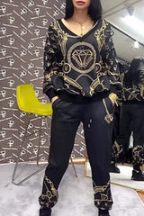 Damski top ze wzorzystymi kryształkami i dopasowane spodnie – dwuczęściowy zestaw