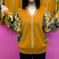 Modne na jesień i zimę 2024 luźne i zakrywające ciało topy z długim rękawem i dekoltem w kształcie litery V