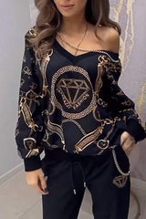 Damski top ze wzorzystymi kryształkami i dopasowane spodnie – dwuczęściowy zestaw