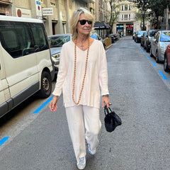 Dwuczęściowy komplet składający się z topu i spodni w jednolitym kolorze