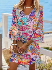 Sukienka z dekoltem w serek i rękawami typu trąbka w świeżym print