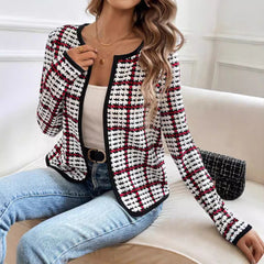 Jesienna kurtka kardigan zapinana na zamek, w małym stylu