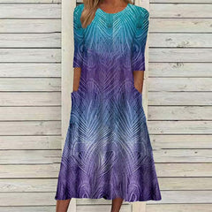 Sukienka z okrągłym dekoltem, pół rękawami i kieszeniami z nadrukiem