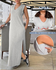 Sukienka swobodna z dekoltem w serek i rozcięciem na dole oraz bezpiecznym wycięciem na ręce