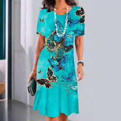 Sukienka plisowana z nadrukiem