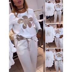 Damski top z kwiatowym nadrukiem i dekoltem