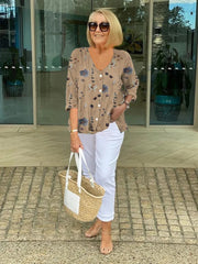 Elegancka koszula z kwiatowym wzorem i guzikami
