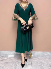 🌸Elegancka sukienka z dekoltem w serek