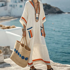 Elegancka długa sukienka z kieszeniami