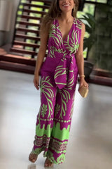 Niepowtarzalny, drukowany kombinezon bez rękawów z dekoltem w serek i wiązaniem w talii