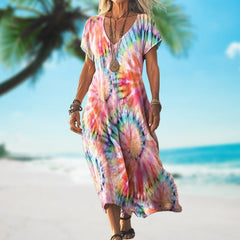 Sukienka damska z luźnym nadrukiem i długim dekoltem w serek